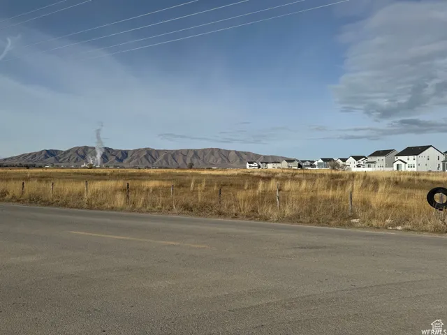 View of asphalt road featuring a mountain view