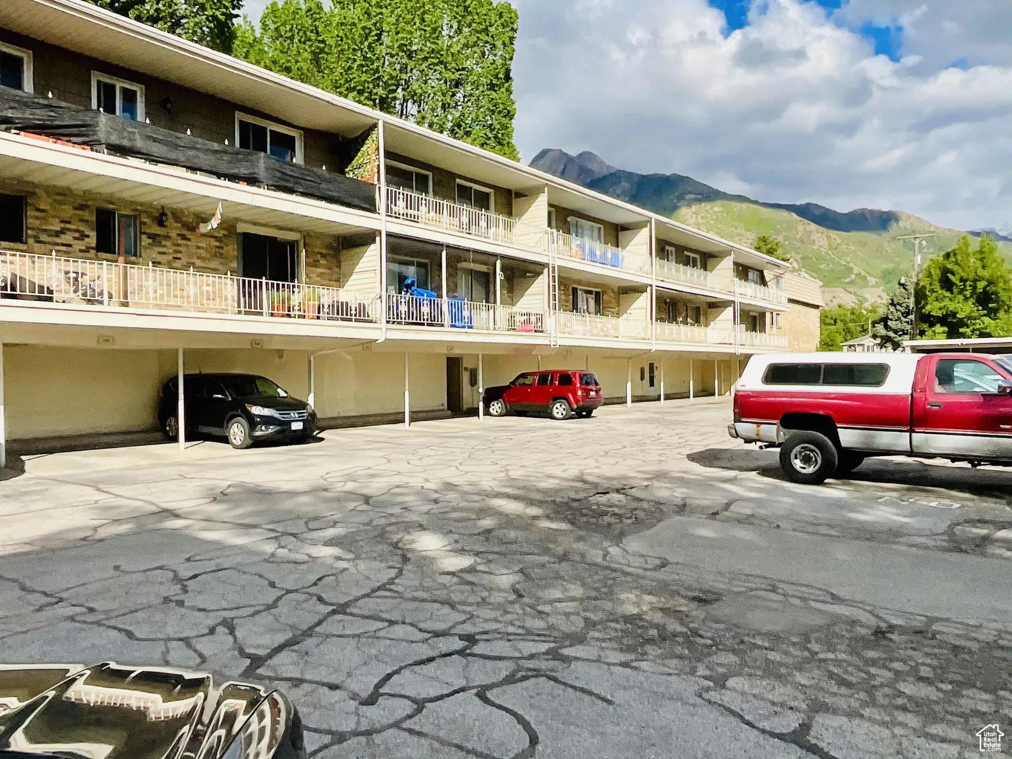 Uncovered parking lot with a mountain view