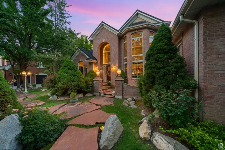 View of front of house with brick siding