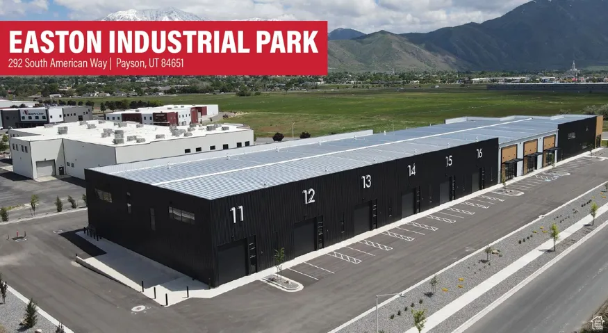 Aerial view of an industrial area and a mountain backdrop