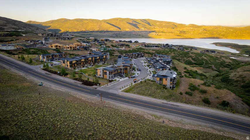 Modern residences featuring multi-story designs, varied exterior finishes, and established landscaping