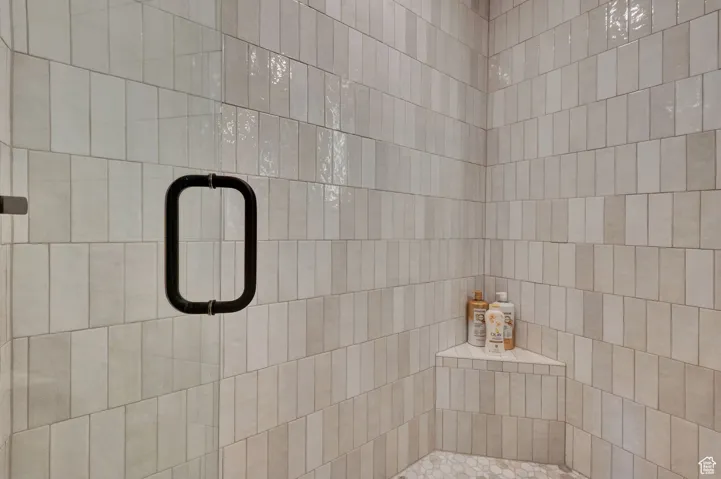 Bathroom featuring tiled shower