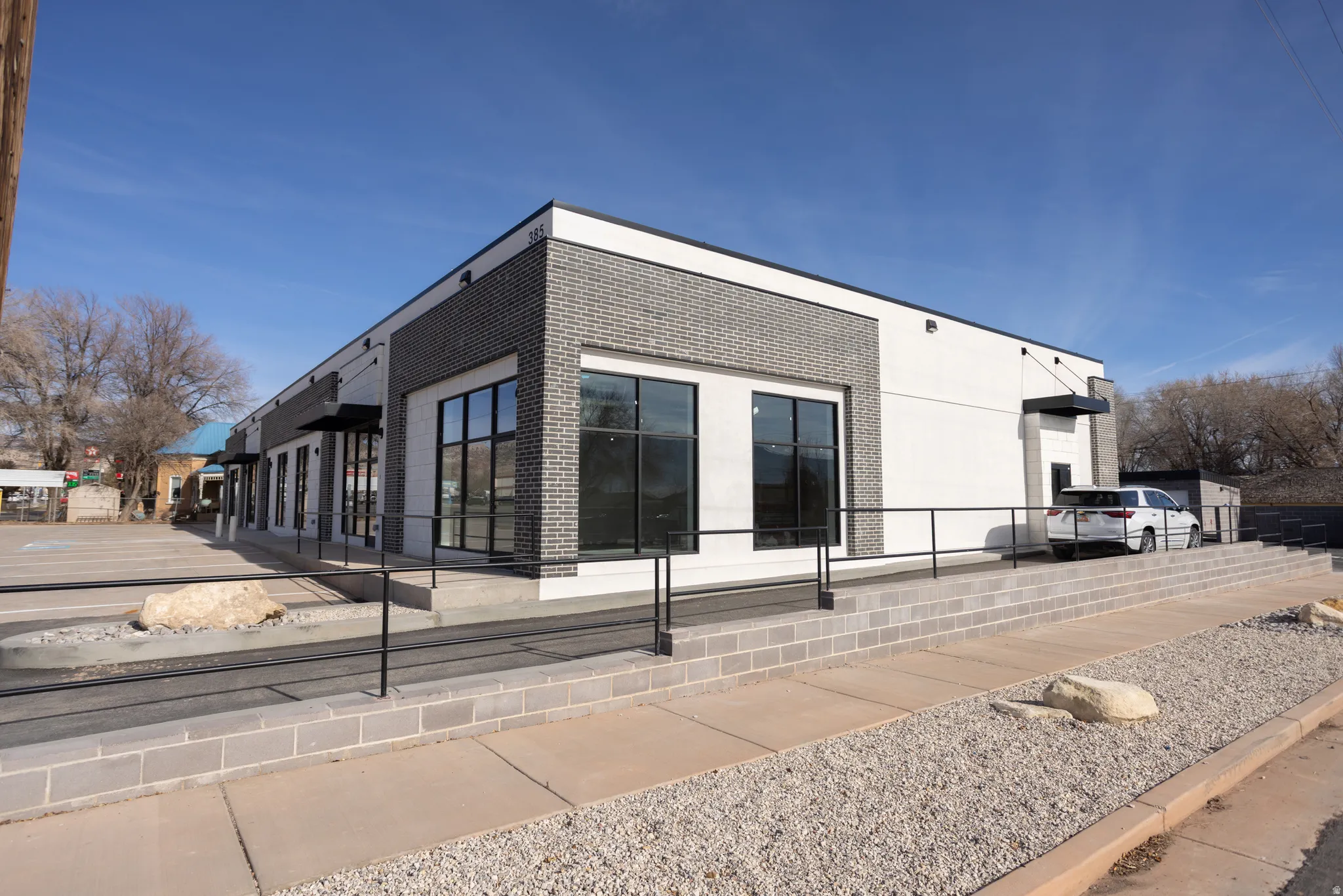 View of side of property featuring brick siding