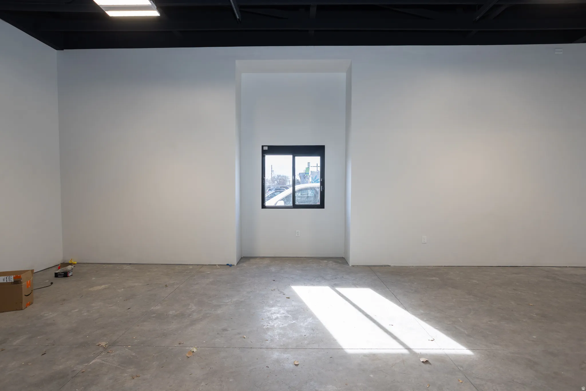 Spare room with concrete floors