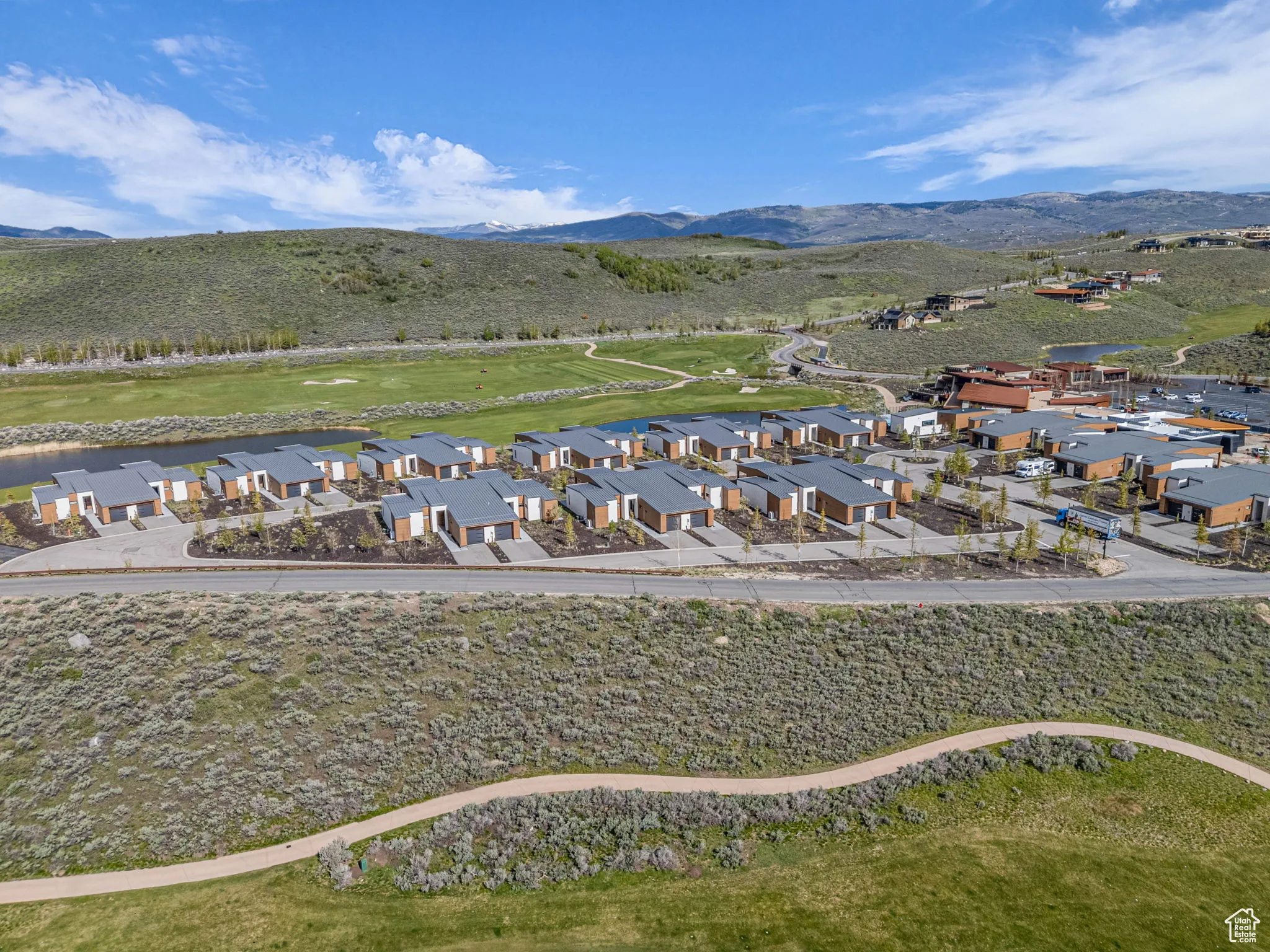 Aerial view of residential area with mountains