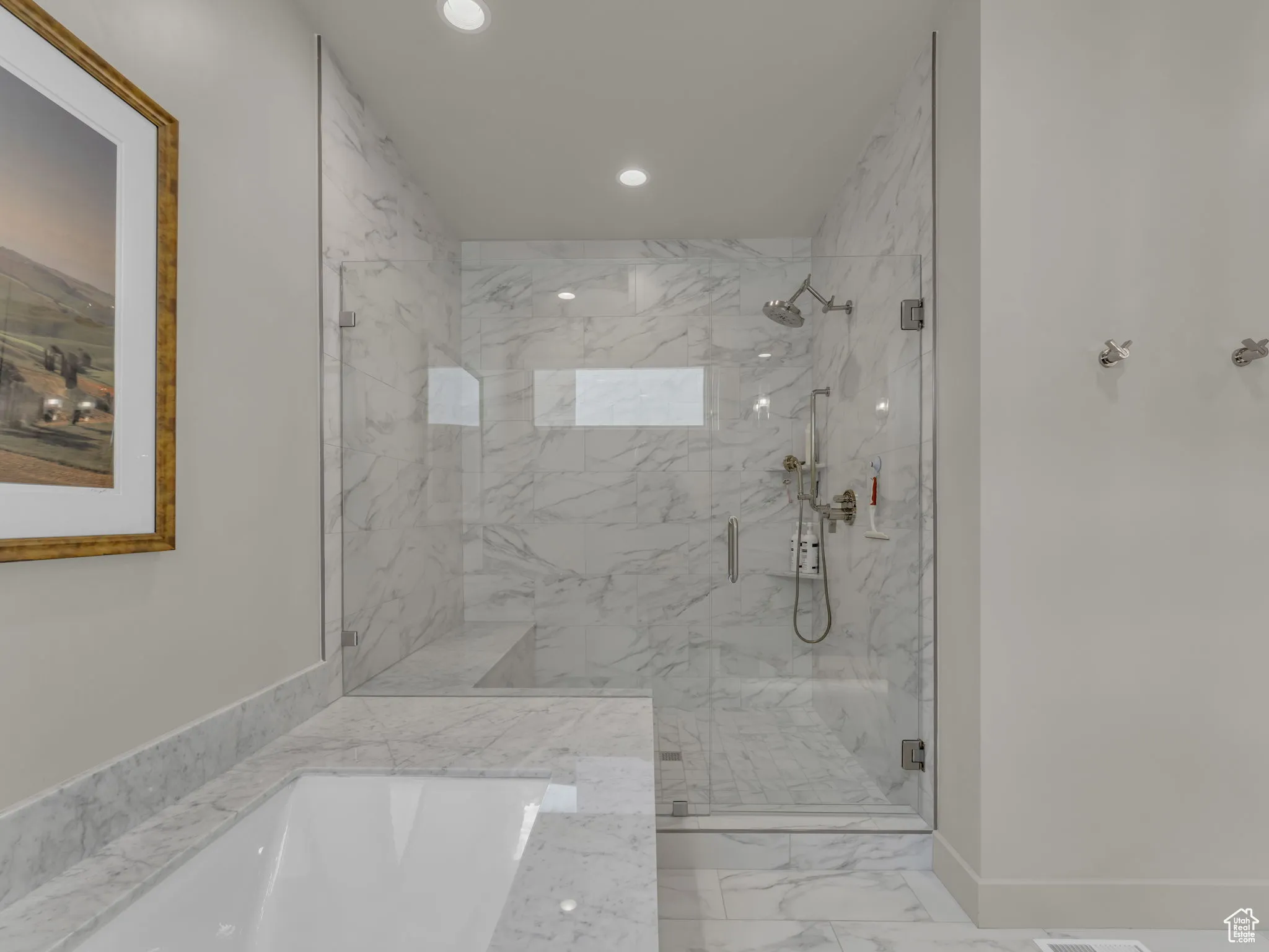 Full bathroom with recessed lighting, a marble finish shower, and marble look tile flooring