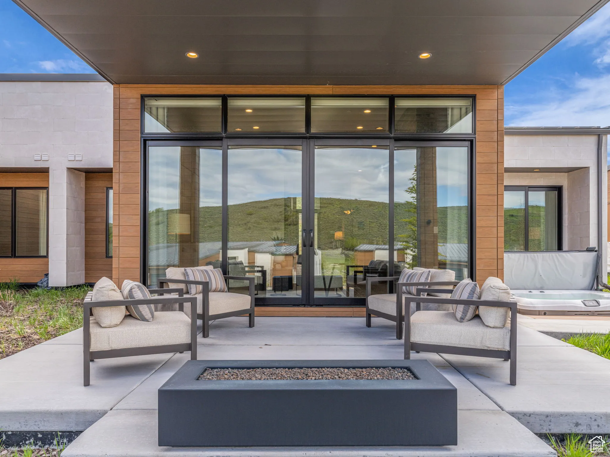 View of patio / terrace featuring an outdoor fire pit