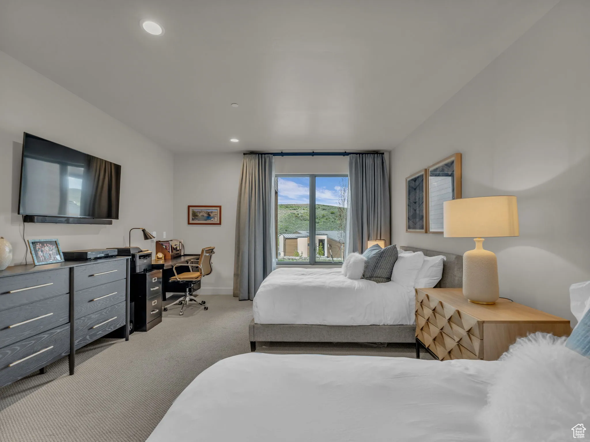 Bedroom with carpet flooring, recessed lighting, baseboards, and a desk