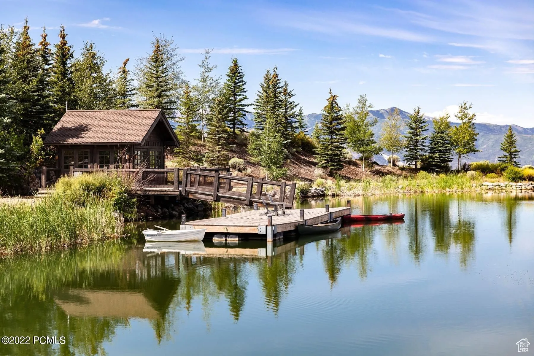 Dock with a water and mountain view