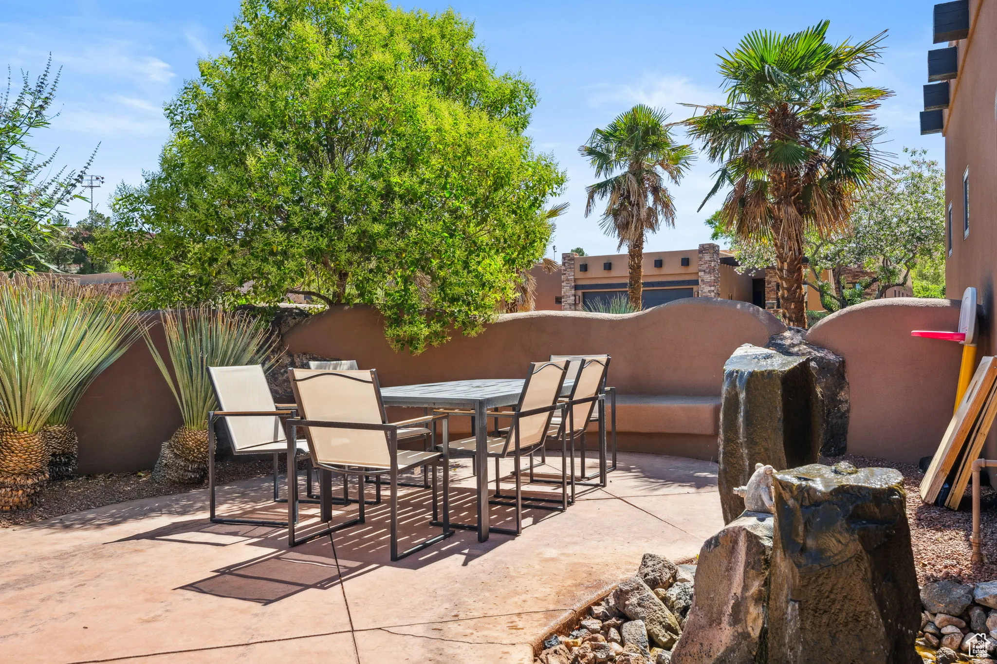 View of patio with outdoor dining area