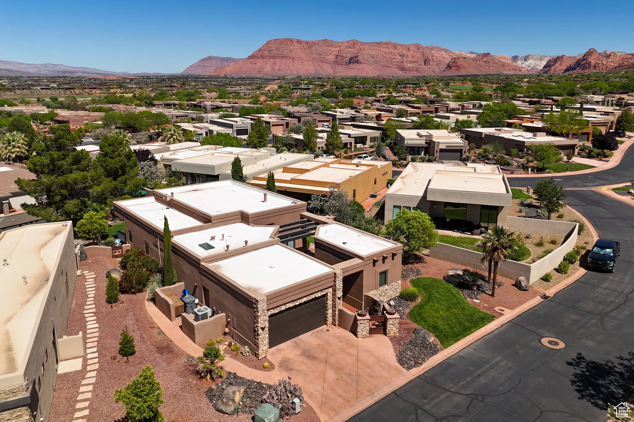 Aerial view of residential area with mountains