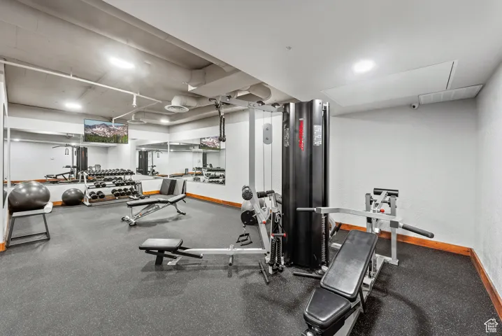 Gym featuring baseboards