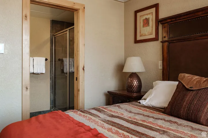 Bedroom with a textured wall