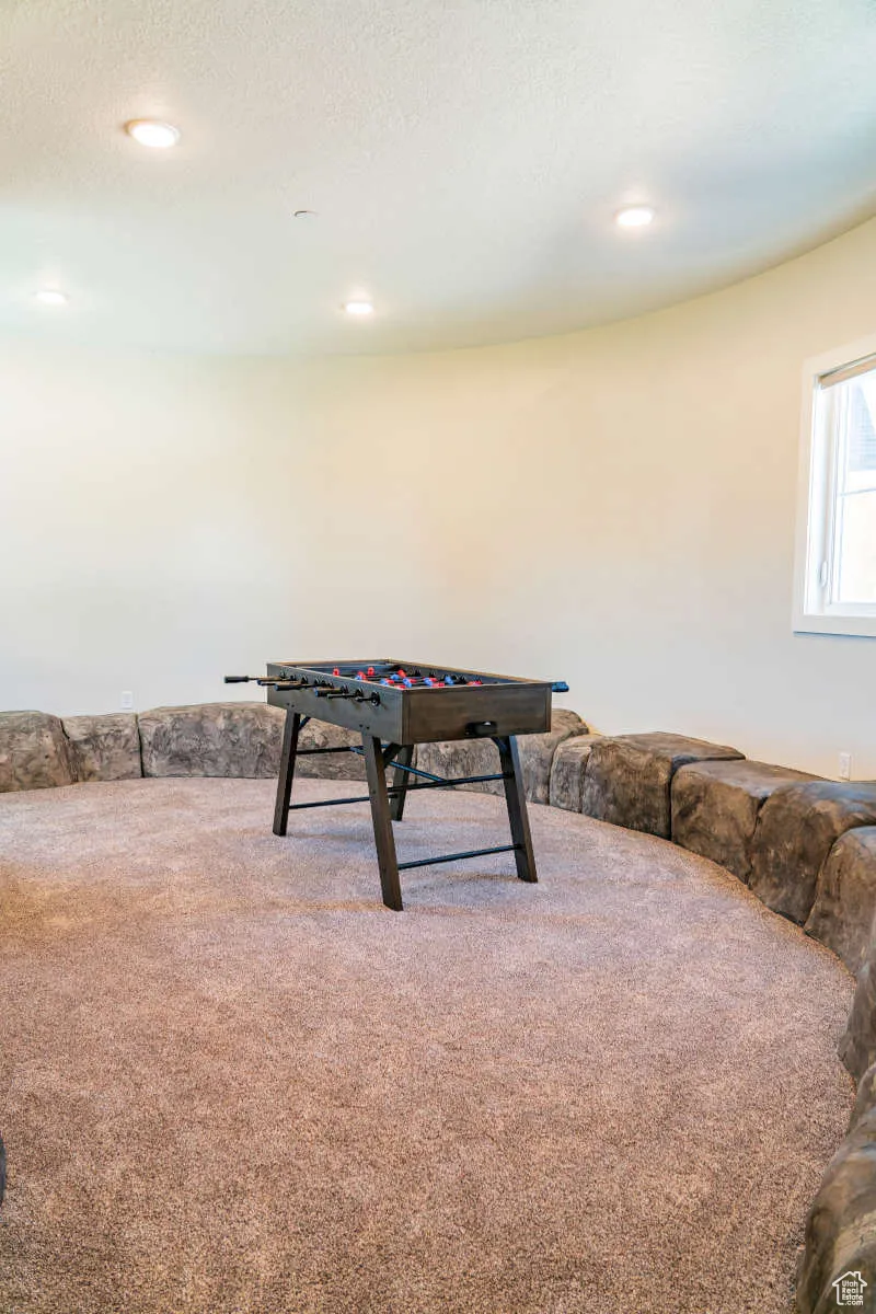 Game room featuring carpet and recessed lighting