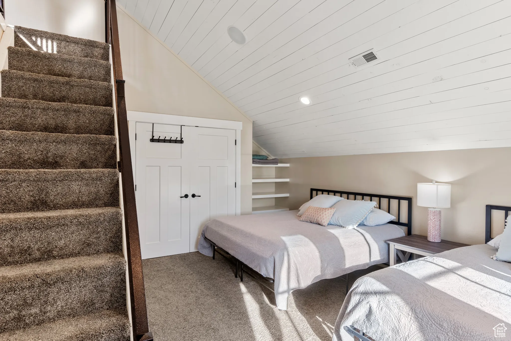 Carpeted bedroom with lofted ceiling, wooden ceiling, and recessed lighting
