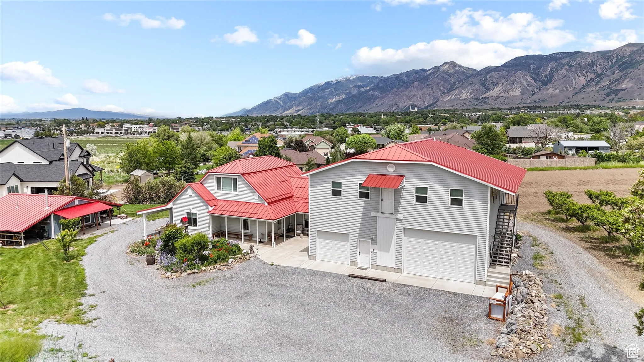 Aerial view of residential area featuring mountains