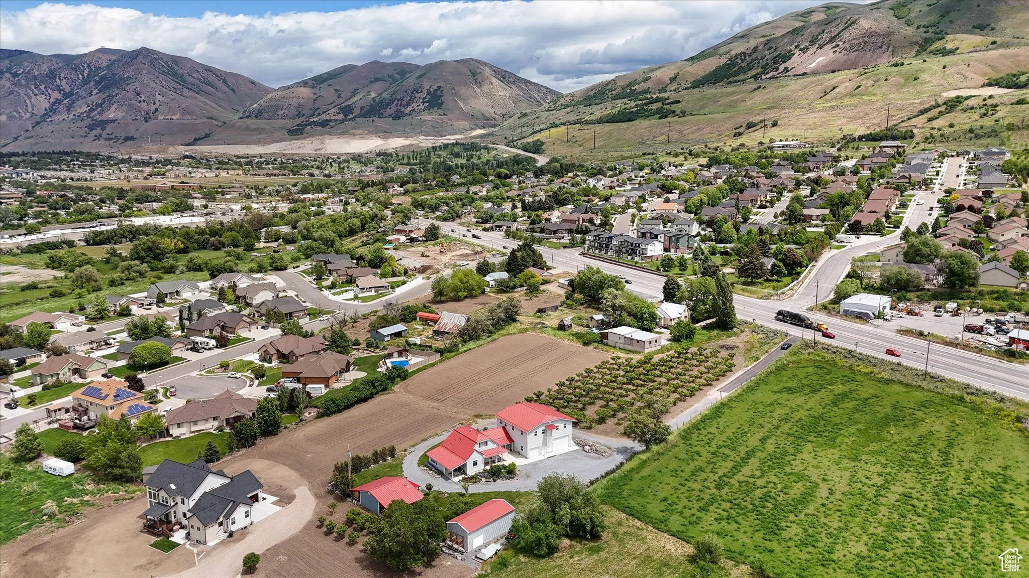 Aerial view of residential area with a mountainous background
