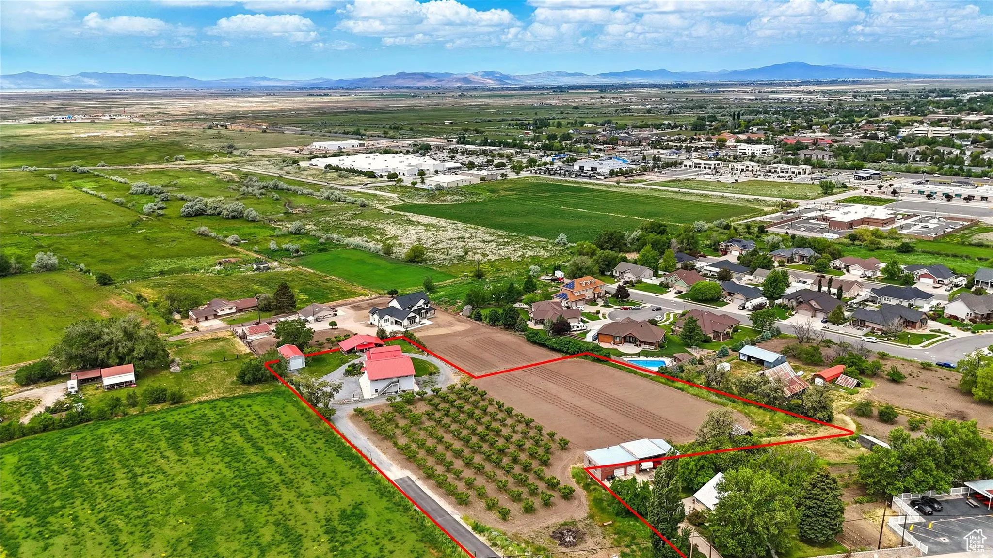 View of rural area with a mountainous background and property parcel outlined