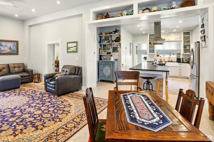 Dining space featuring recessed lighting and ceiling fan
