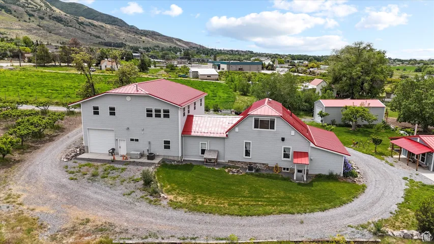 View of subject property with mountains