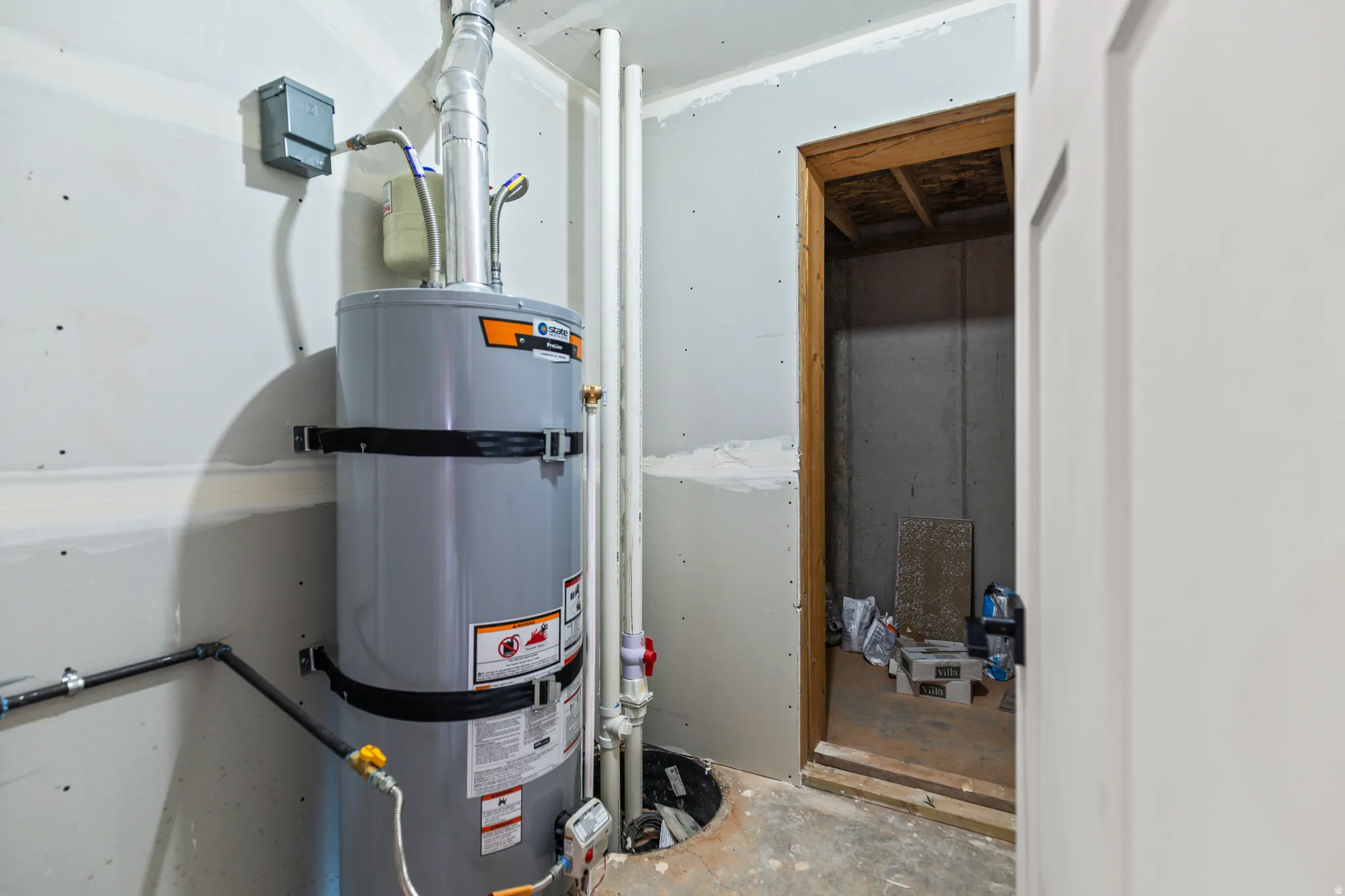 Utilities featuring strapped water heater