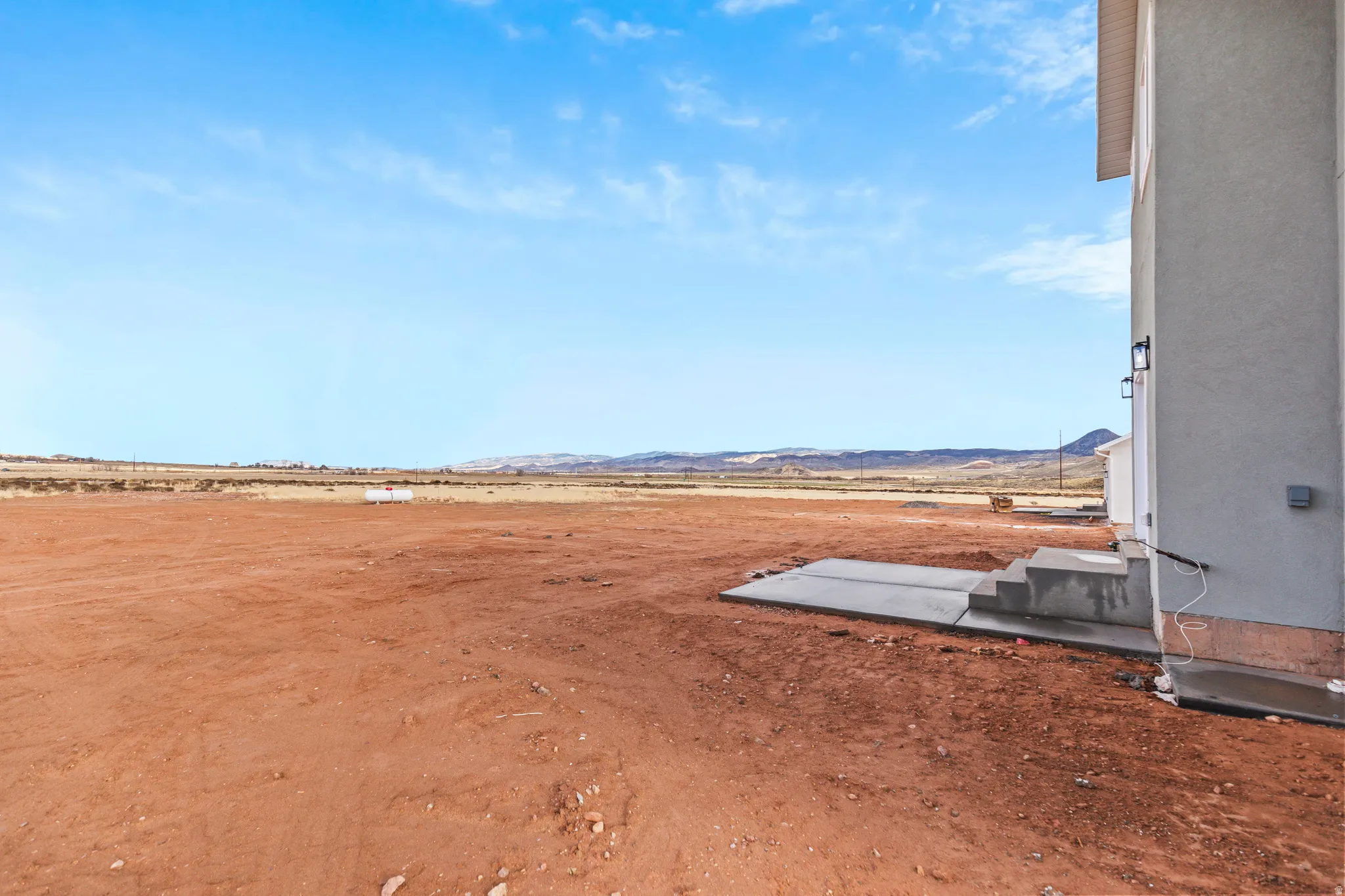 View of yard with a view of countryside and a mountain view
