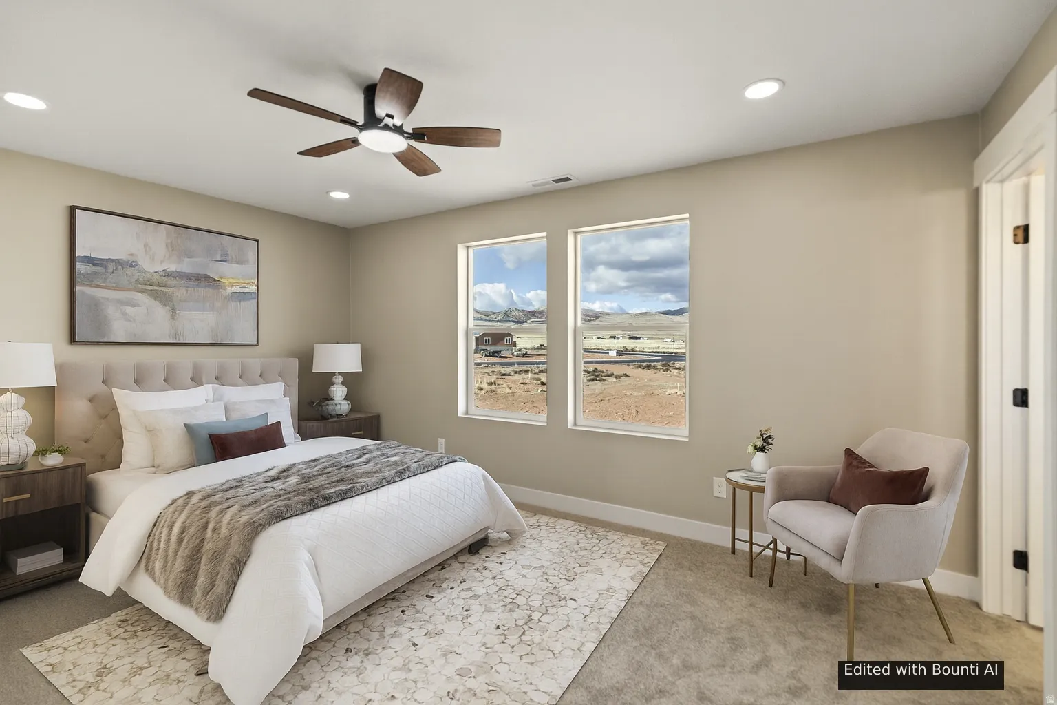 Bedroom with light colored carpet, ceiling fan, and recessed lighting