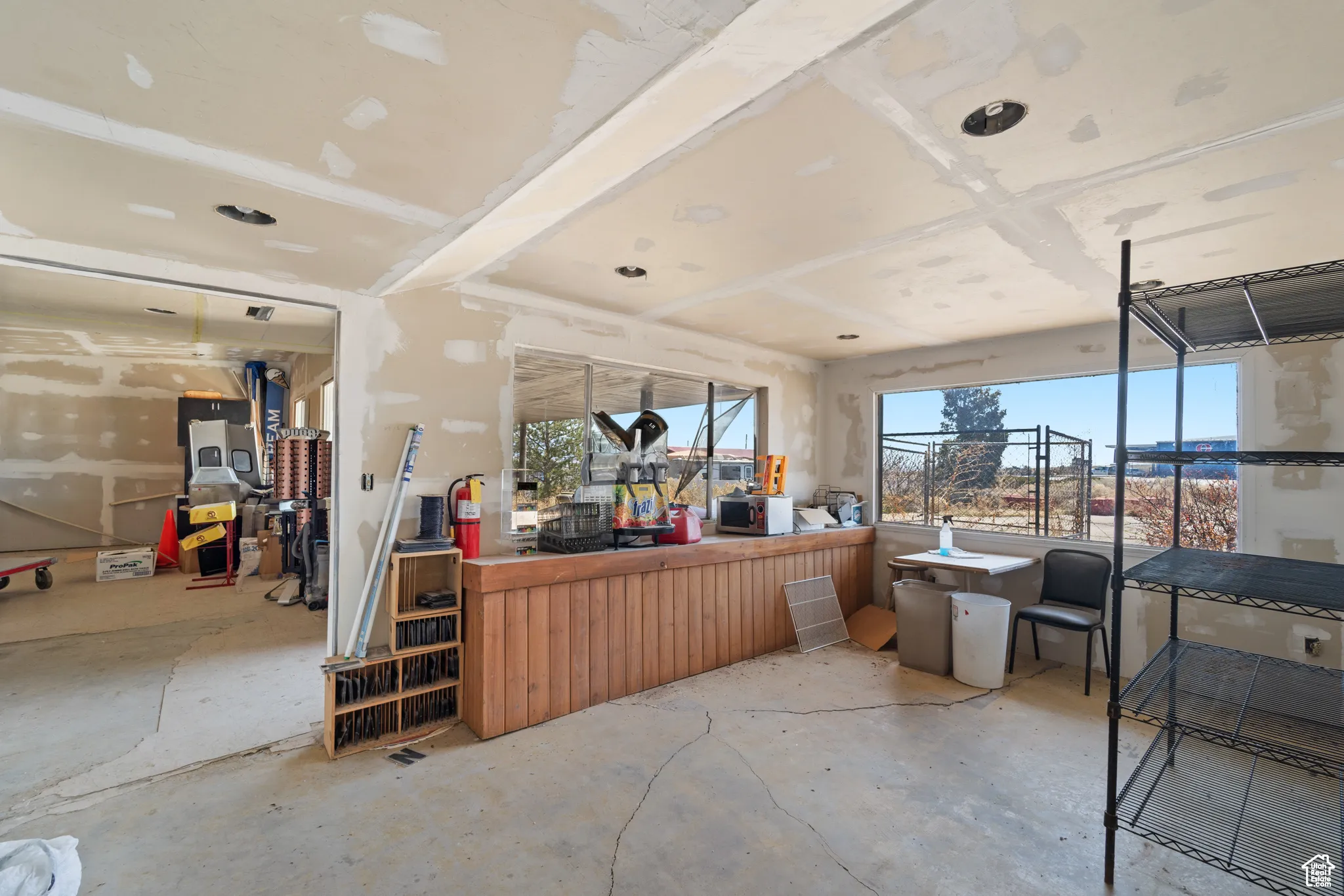 Miscellaneous room featuring concrete floors