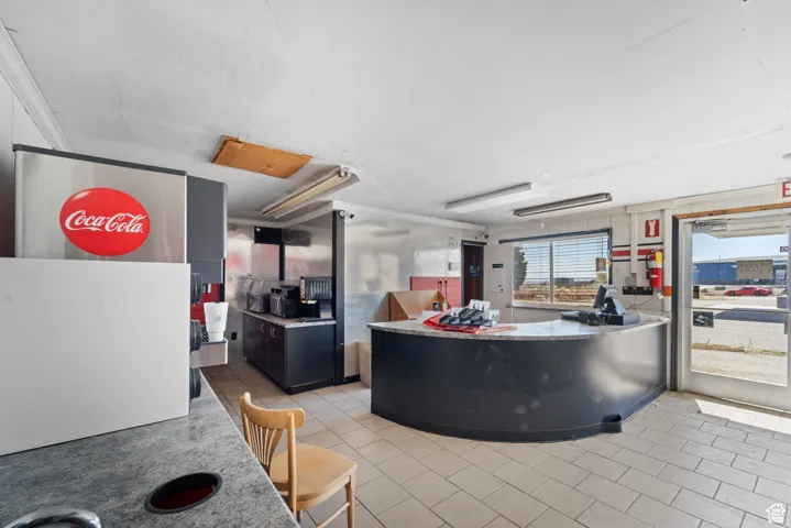 Reception area featuring crown molding