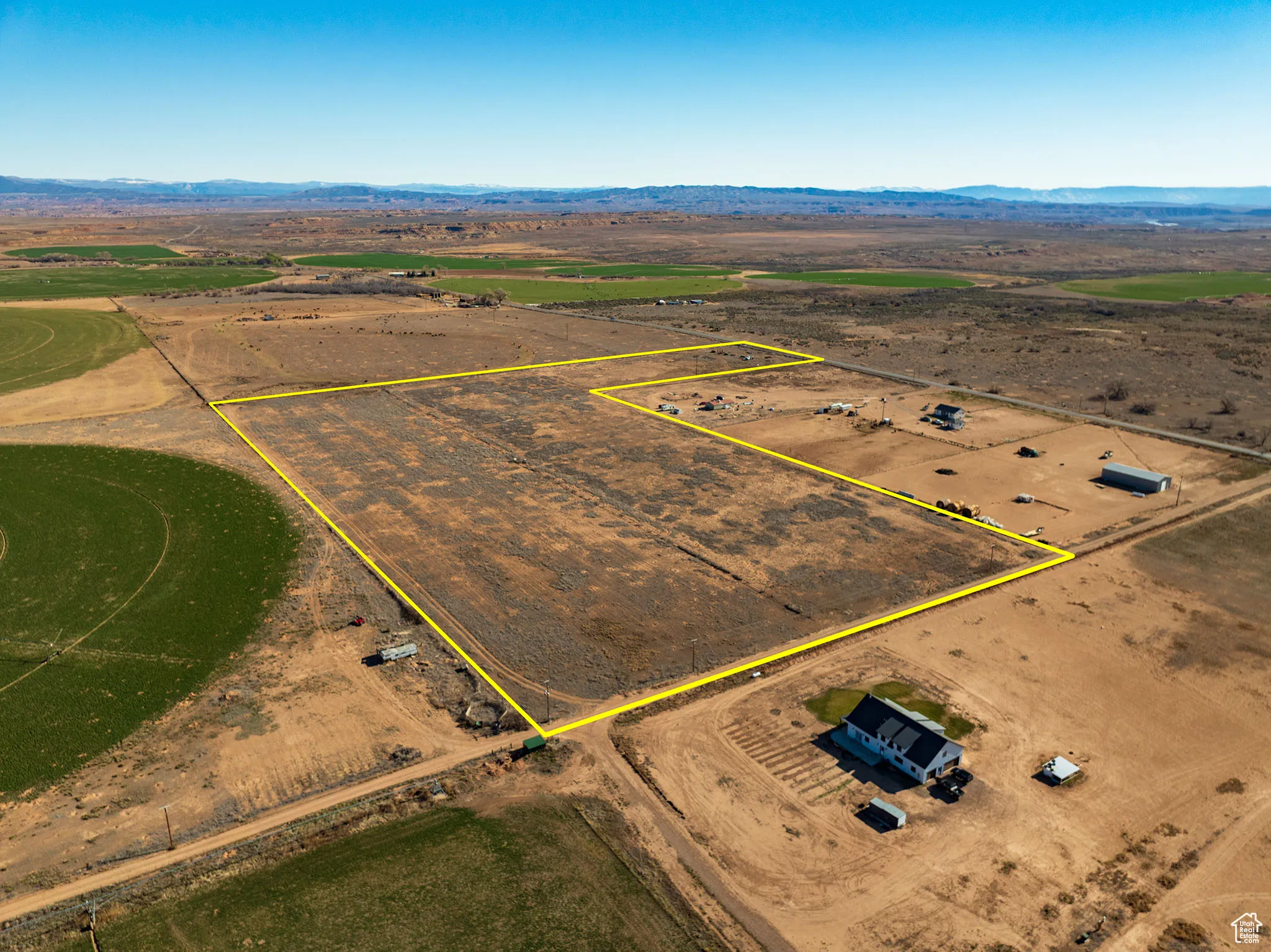 View of rural area featuring a mountainous background and property boundaries highlighted