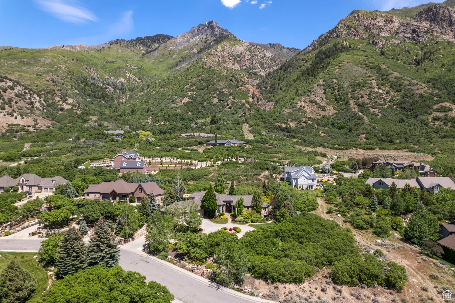 View of mountain background featuring nearby suburban area