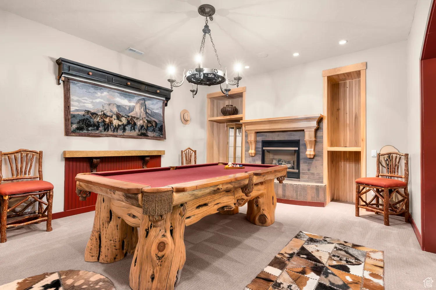 Game room with carpet flooring, a glass covered fireplace, pool table, and recessed lighting