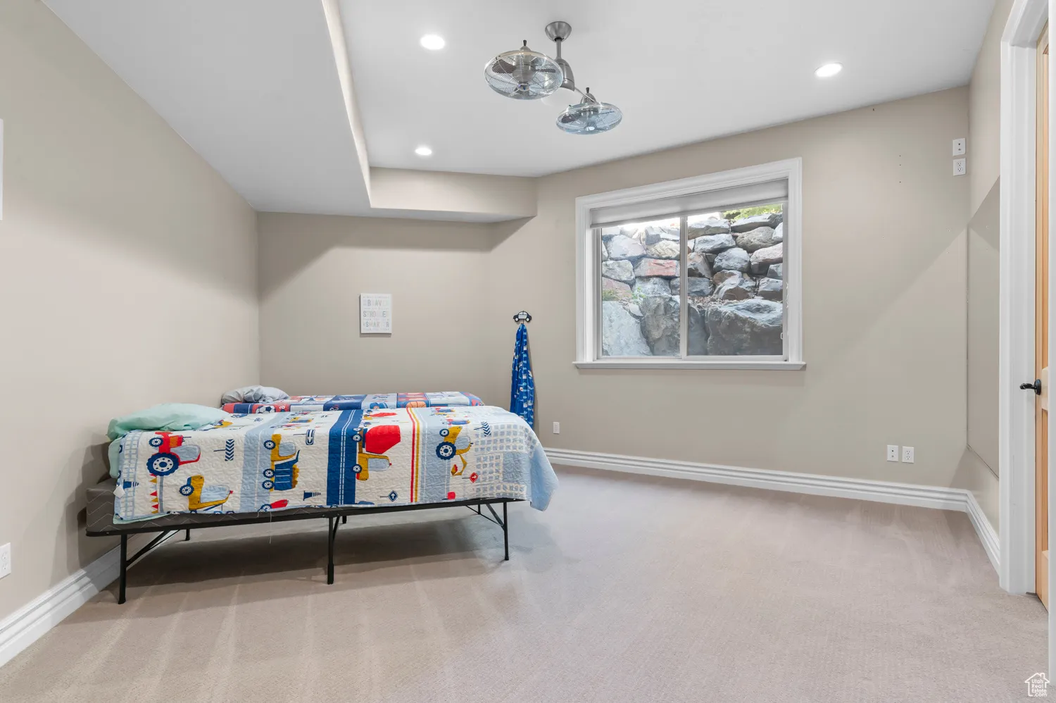 Bedroom with carpet floors, baseboards, and recessed lighting