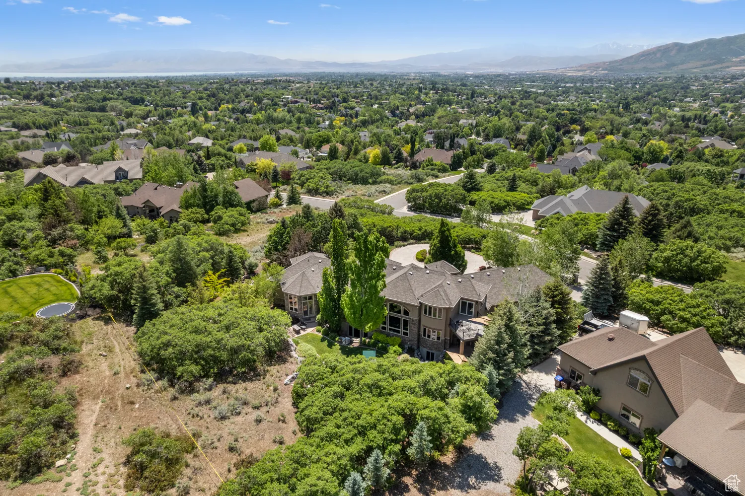 Aerial view of residential area with a mountain backdrop