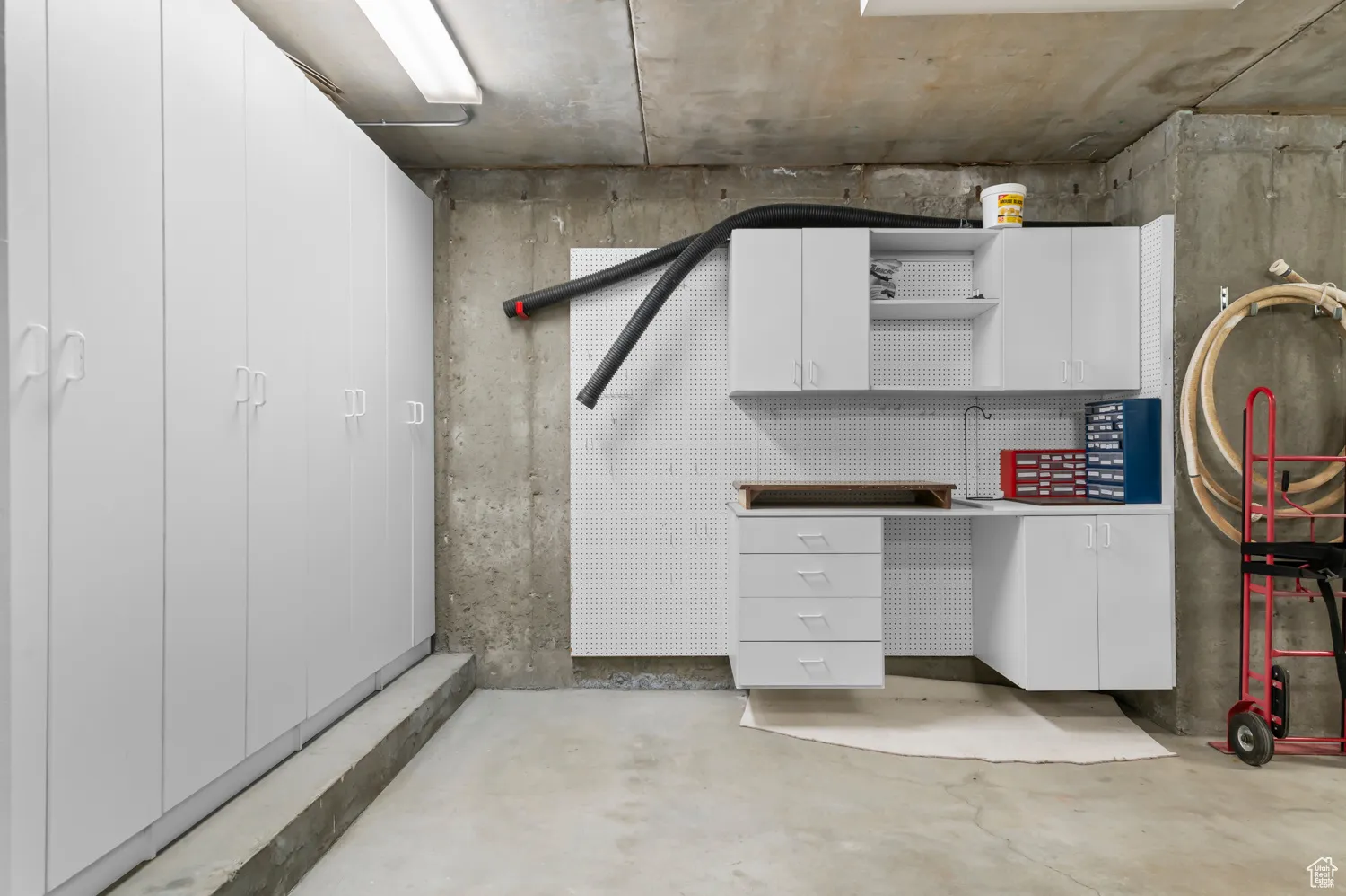 Garage with workbench and lockers