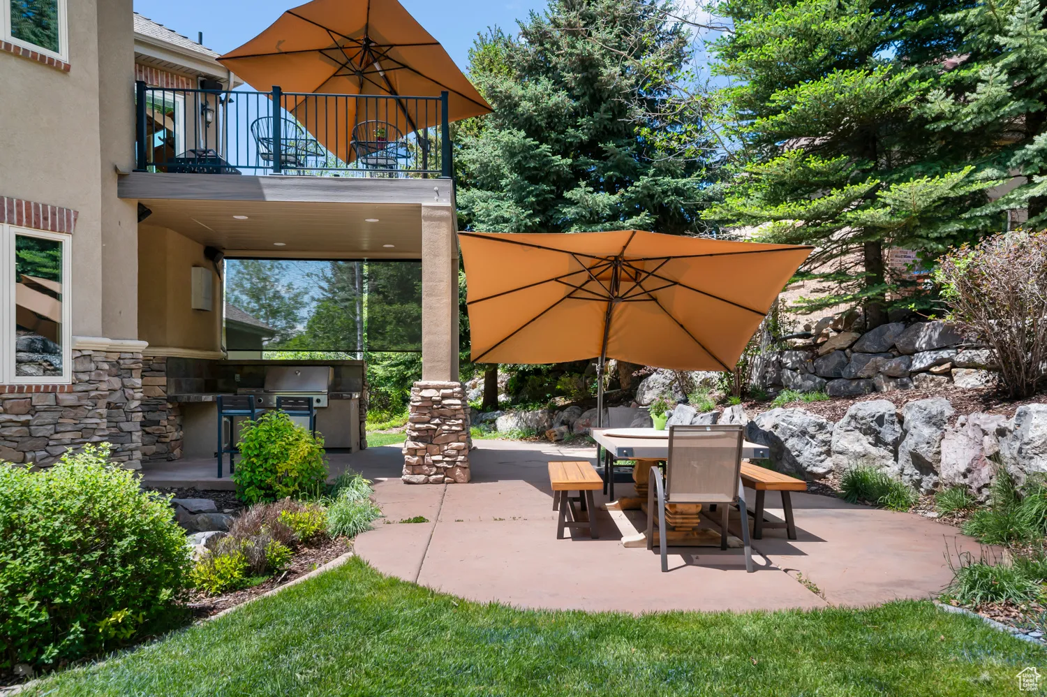 View of patio / terrace with a balcony, area for grilling, and outdoor dining area