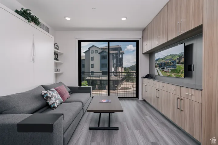 Living area featuring light wood-style flooring