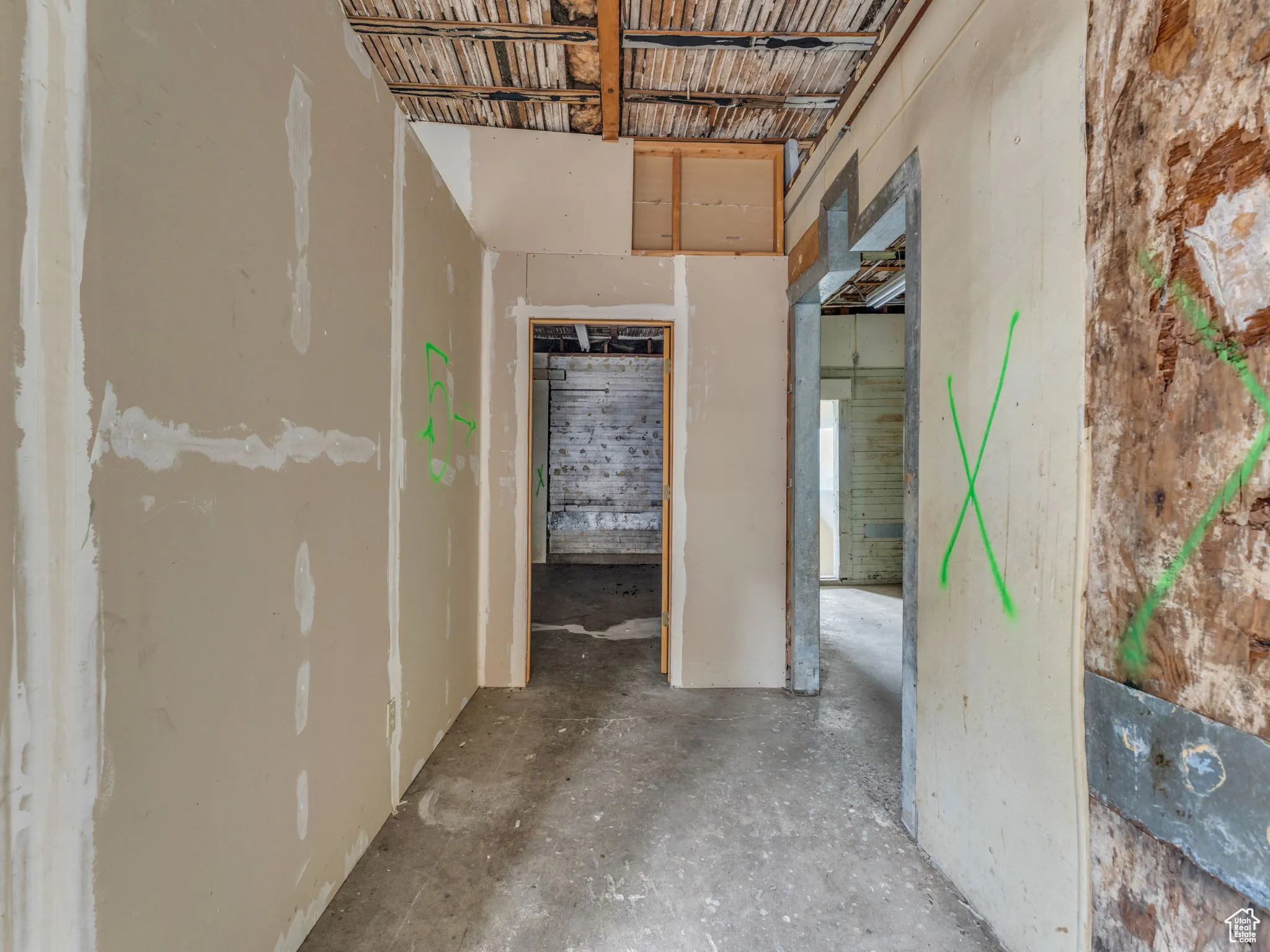 Hall featuring concrete floors