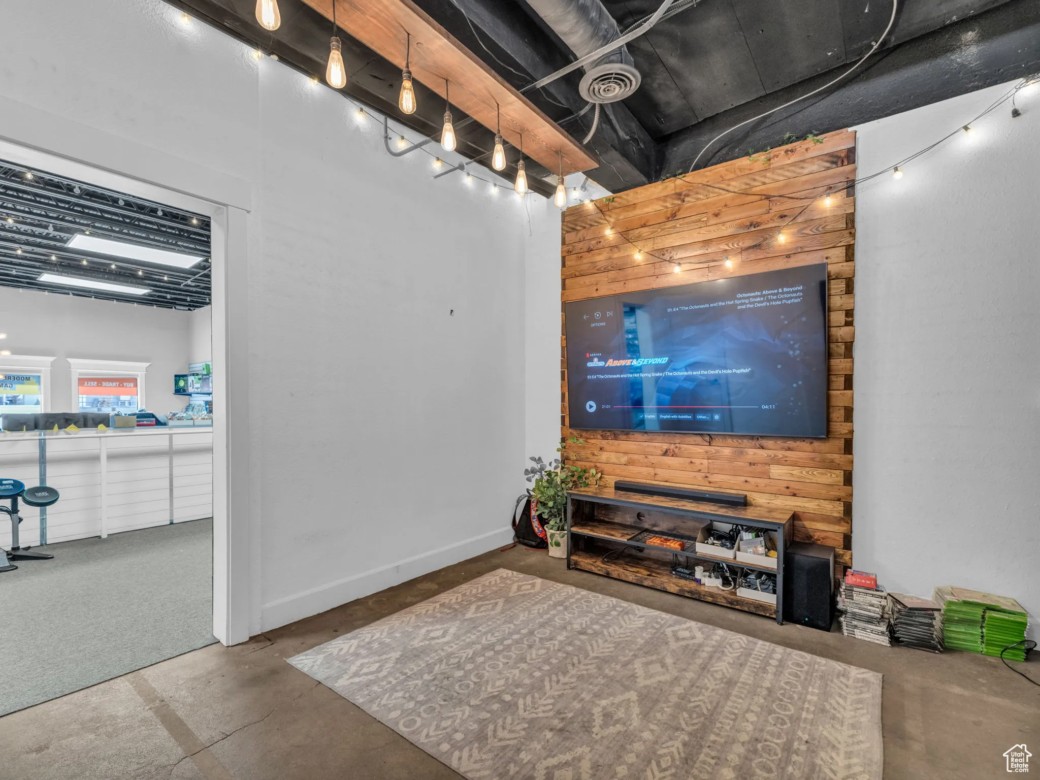 Living room featuring concrete floors