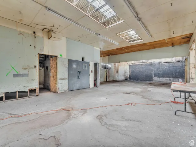 Miscellaneous room featuring concrete flooring