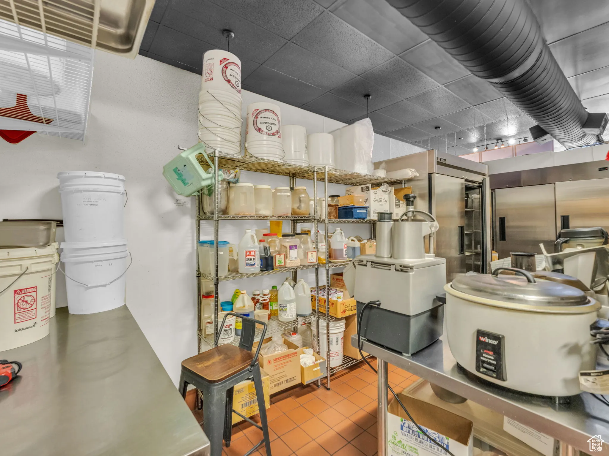 Below grade area featuring tile patterned floors