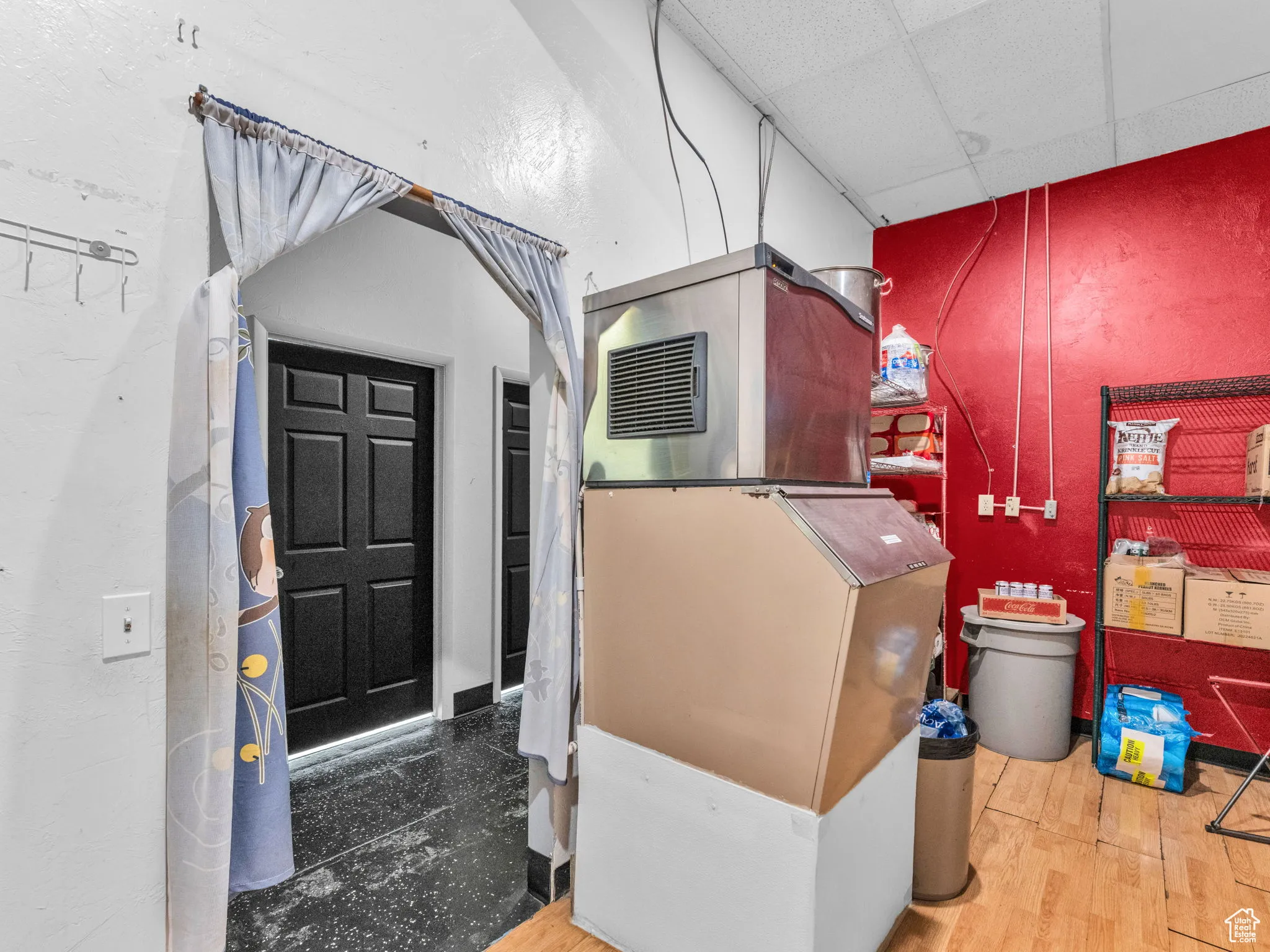 Basement featuring a drop ceiling