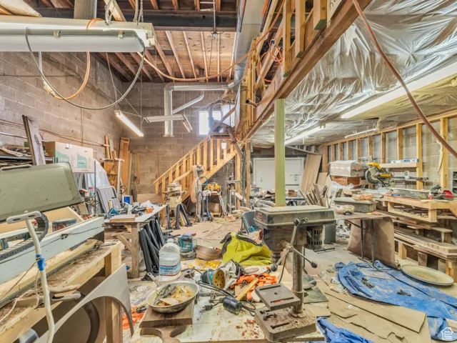 Misc room with a workshop area