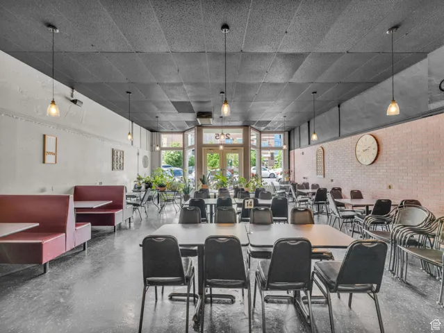 Dining room with brick wall