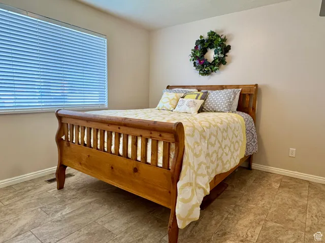 Bedroom with baseboards