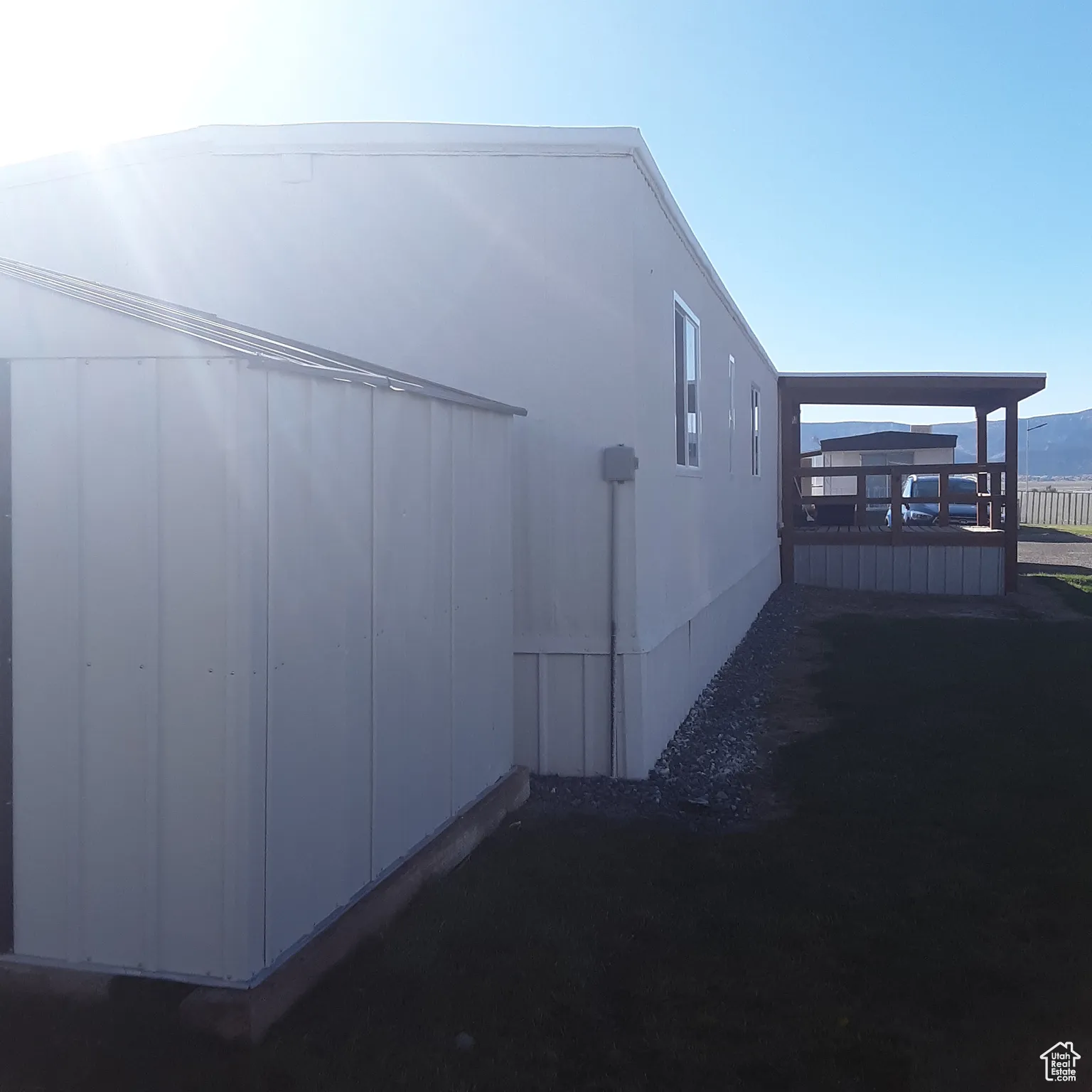 View of home's exterior featuring a deck