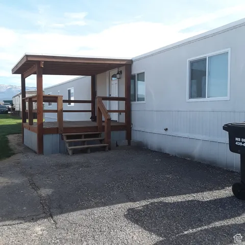 View of front of home featuring a deck