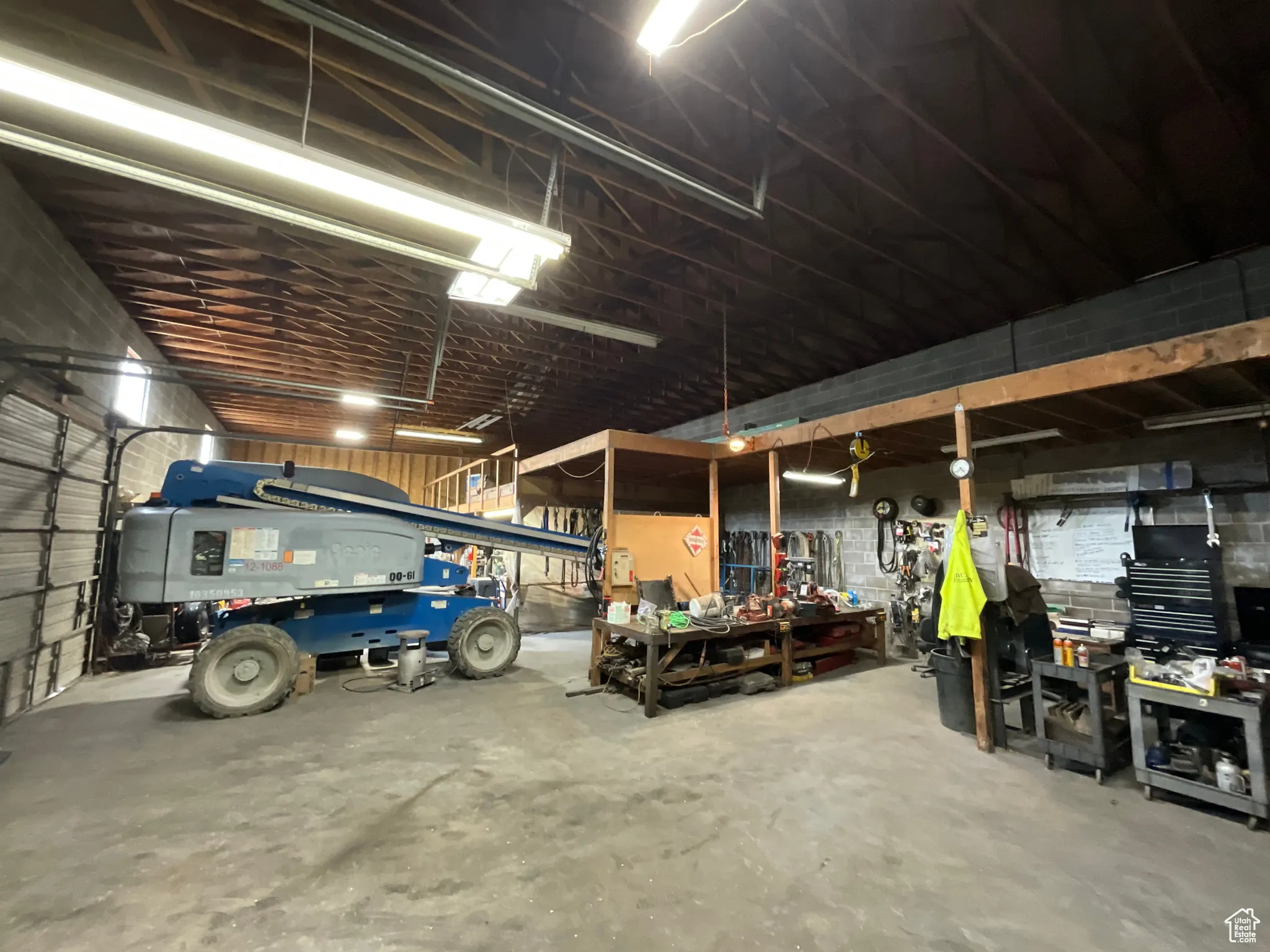 Garage featuring a workshop area