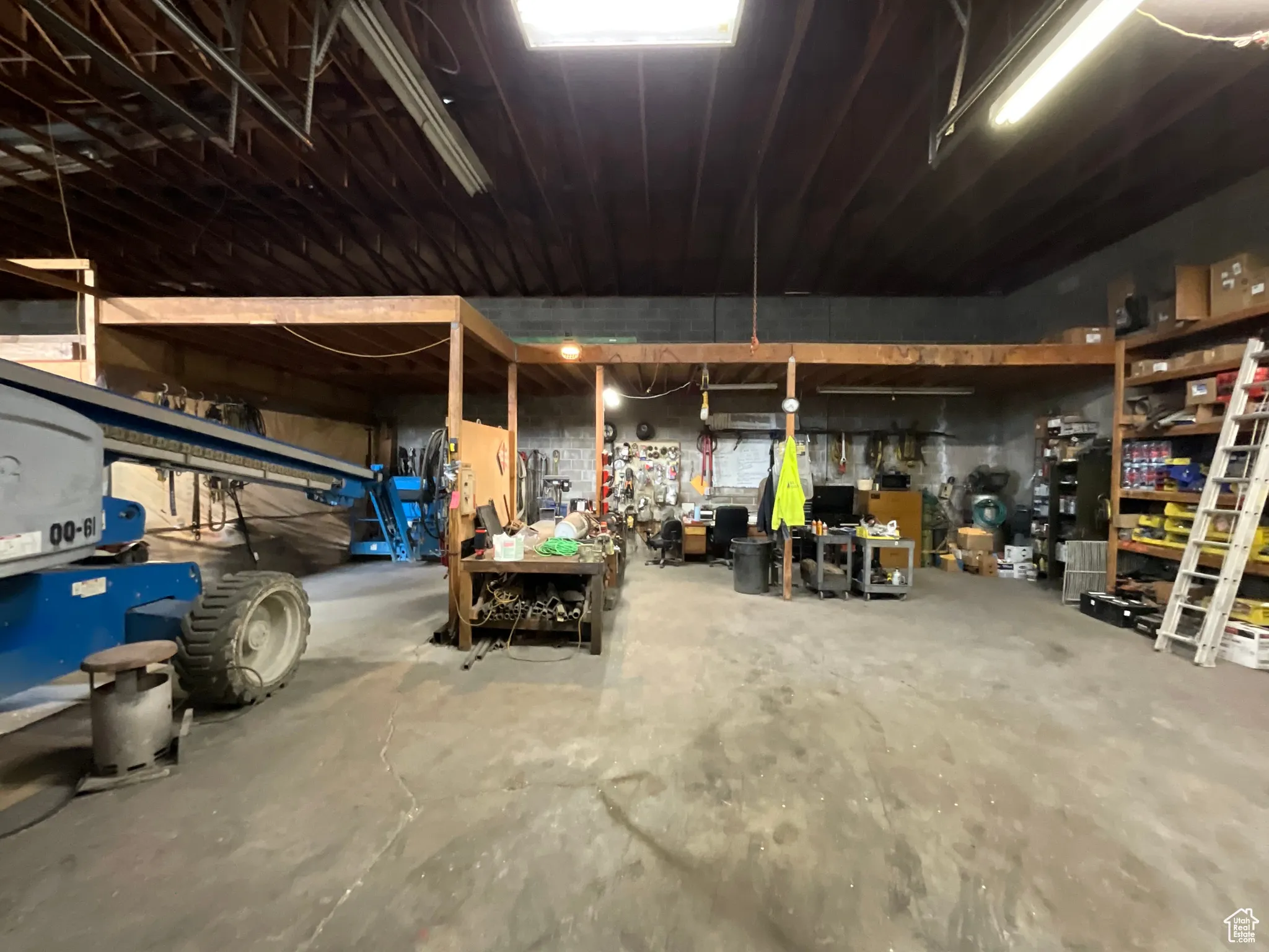 Garage featuring a workshop area