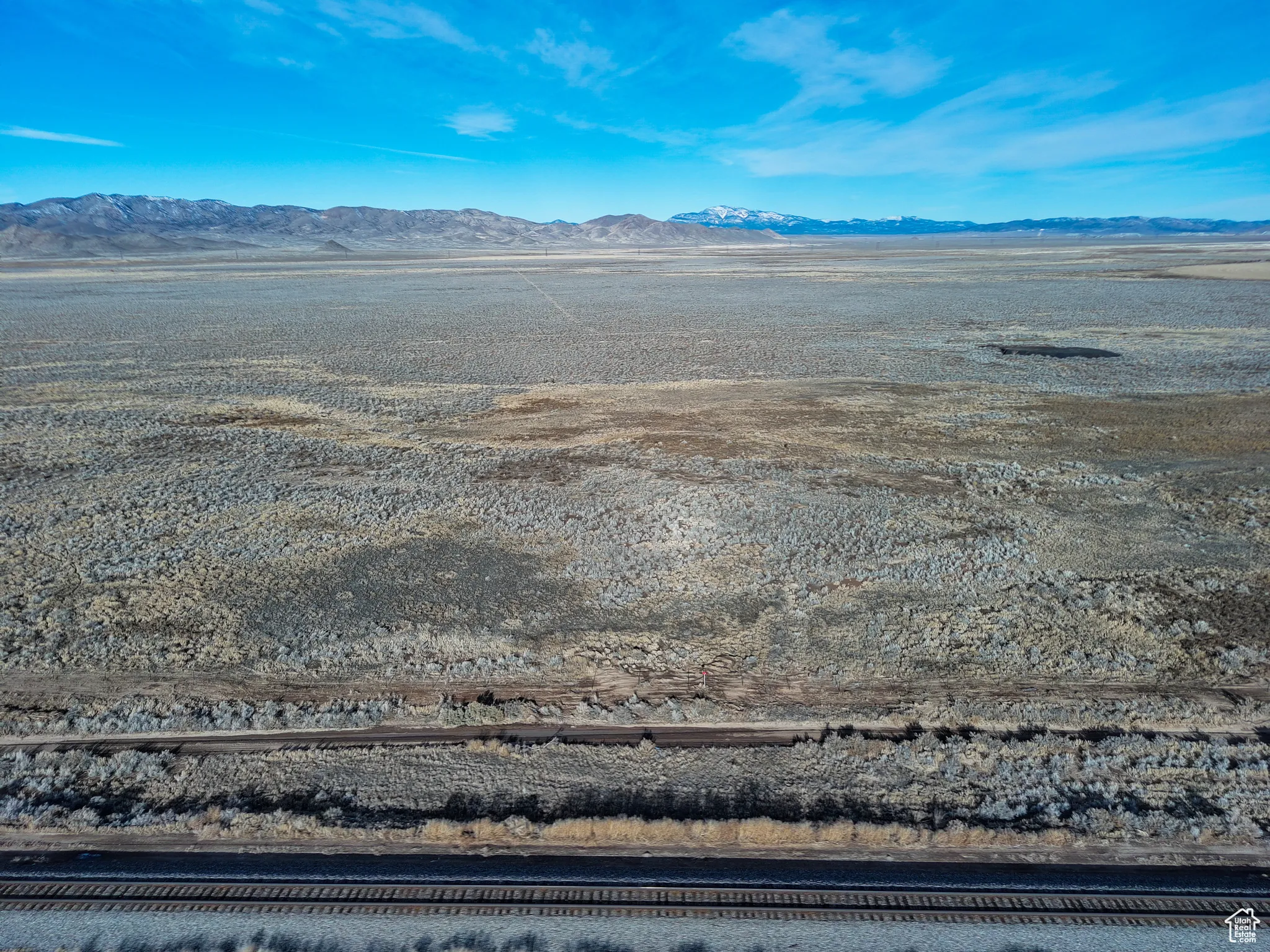 Drone / aerial view of a mountainous background